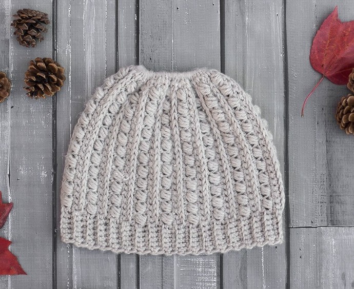 Helping our users. Messy Bun Crochet Hat. Helping our users. Messy Bun Crochet Hat.