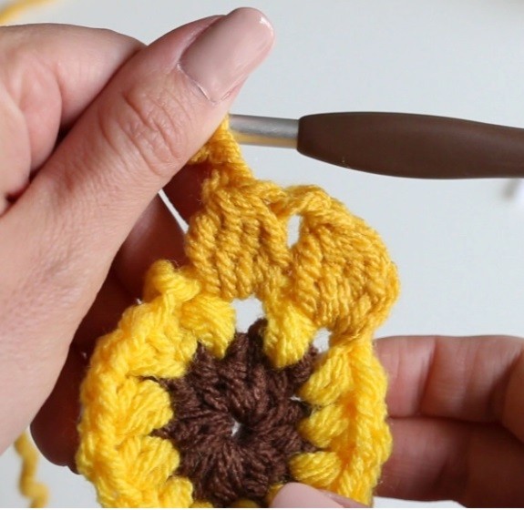 Helping our users. Granny Square with Sunflower Crochet Motif. Helping our users. Granny Square with Sunflower Crochet Motif.