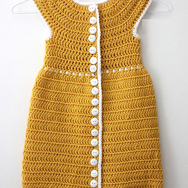 ​Crochet Baby Dress with Daisy Pockets