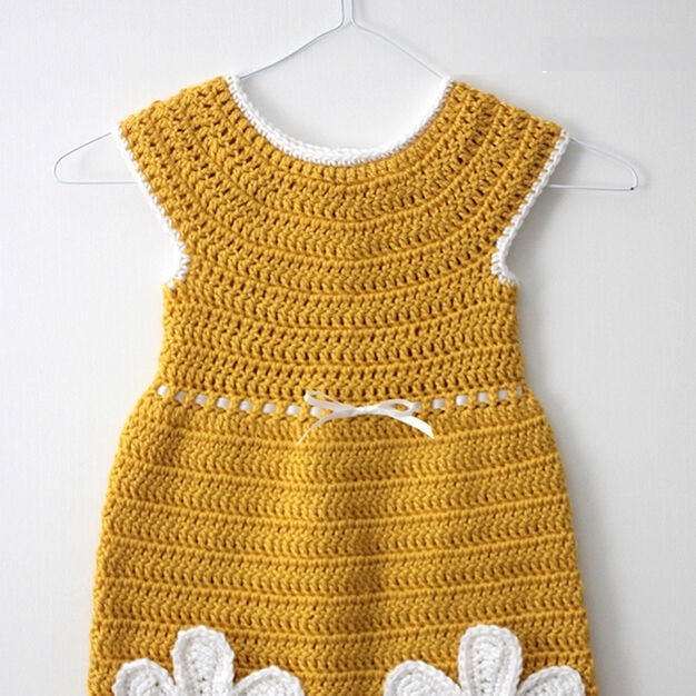 ​Crochet Baby Dress with Daisy Pockets