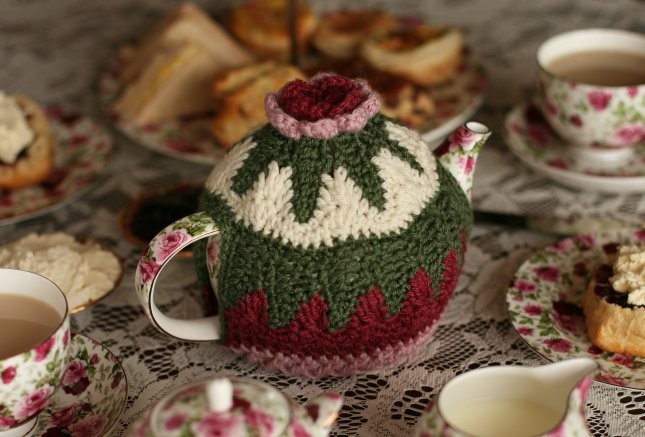 Helping our users.​ Crochet Tea Cover with Rose on the Top.