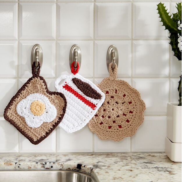 Three ”Delicious” Pot Holders Three ”Delicious” Pot Holders