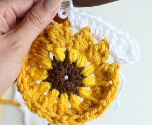 Helping our users. Granny Square with Sunflower Crochet Motif. Helping our users. Granny Square with Sunflower Crochet Motif.