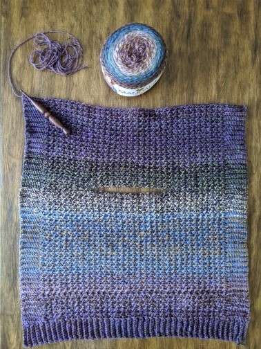 Helping our users. ​Child’s Poncho with Cowl.