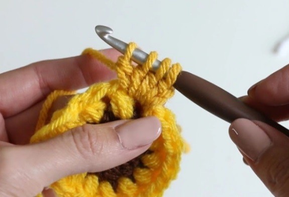 Helping our users. Granny Square with Sunflower Crochet Motif. Helping our users. Granny Square with Sunflower Crochet Motif.