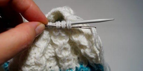 Complete Guide to Knitting a Stylish Baby Hat with Pompom Using Blue and White Yarn Complete Guide to Knitting a Stylish Baby Hat with Pompom Using Blue and White Yarn