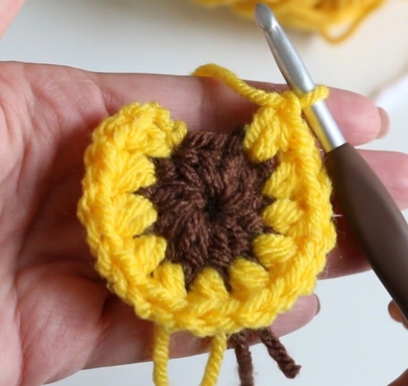 Helping our users. Granny Square with Sunflower Crochet Motif. Helping our users. Granny Square with Sunflower Crochet Motif.