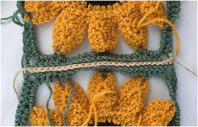 Helping Ann. ​3D Sunflower Crochet Blanket