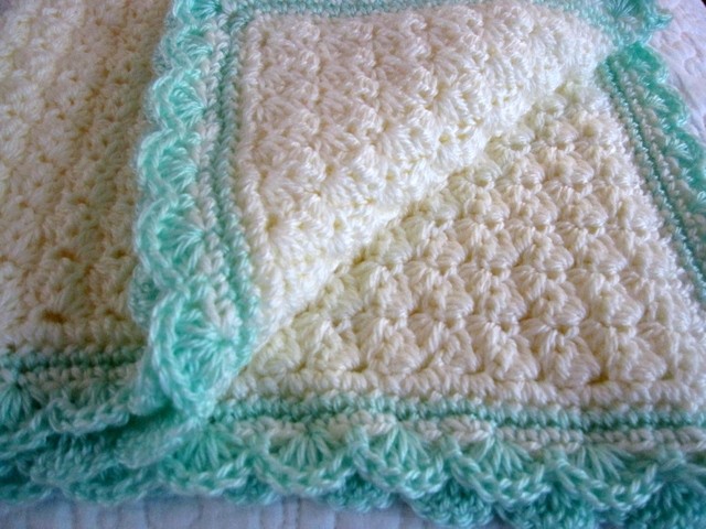 Helping our users. ​Crochet Baby Blanket with Seashells Border.