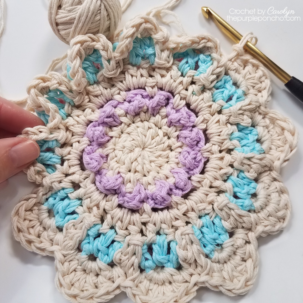 Create a Beautiful and Functional Handmade Crochet Potholder with Floral Berry Design for Your Kitchen