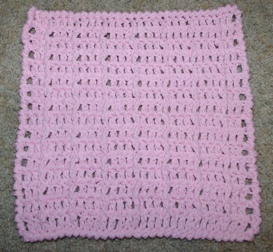 How to Create a Beautiful Handmade Crocheted Dishcloth with Soft Pink Yarn