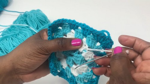 Create a Unique Crochet Granny Square Bucket Hat with Ruffled Brim to Stand Out This Season
