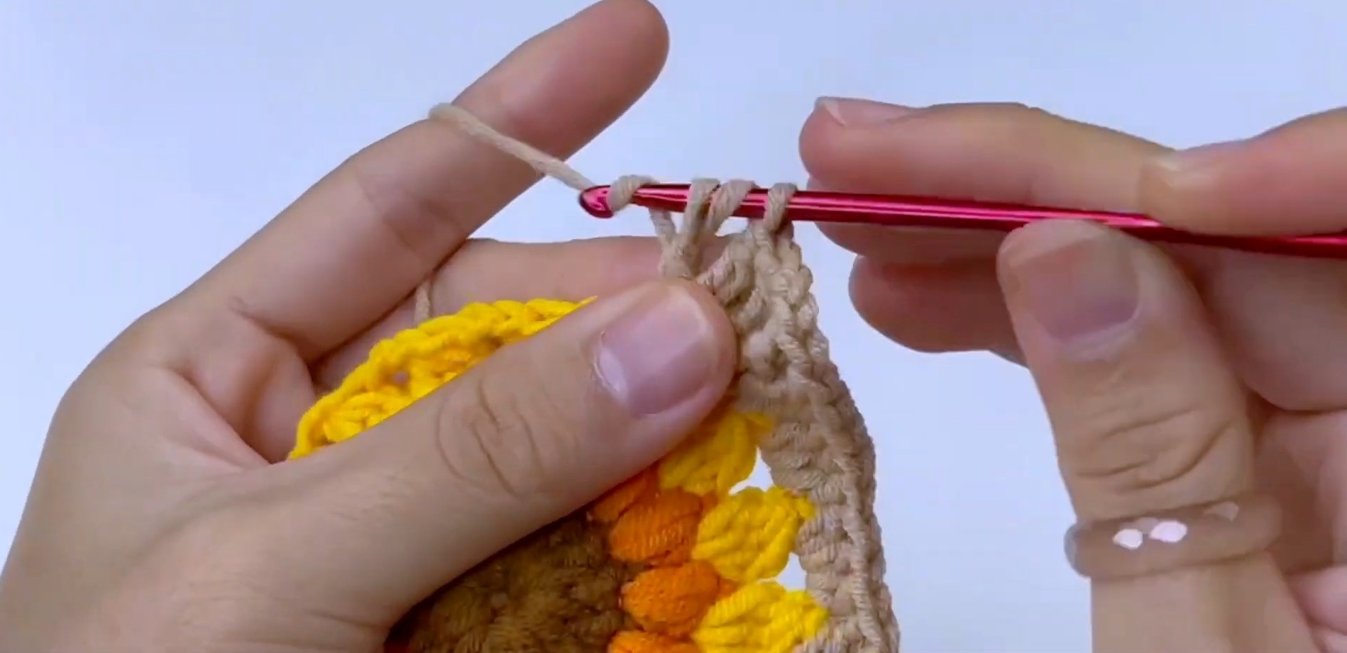 Create a Charming Crochet Sunflower Pouch with Granny Squares for Your Essentials