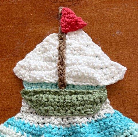 Create Your Own Adorable Crochet Sailboat Hanging Towel for a Cozy Kitchen Vibe