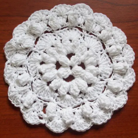 Create a Charming Popcorn Stitch Round Hot Pad - Fun and Unique Crochet Pattern