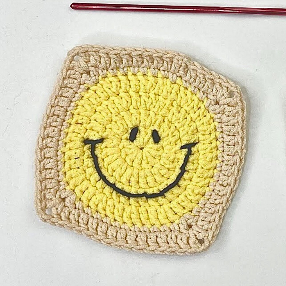 Crochet a Whimsical Smile Emoji Square Coaster - Fun DIY Project for Home Decor