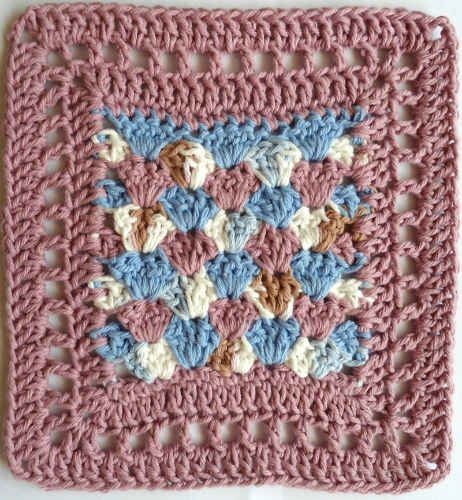 Create a Beautiful Crochet Dishcloth with Shells and Filet Stitching for Your Kitchen or Bathroom