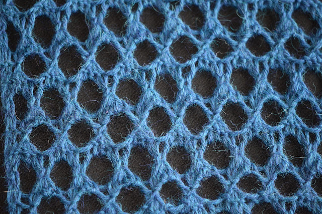 Discover the Elegance of the Sapphire Lace Scarf: A Cozy and Stylish Accessory