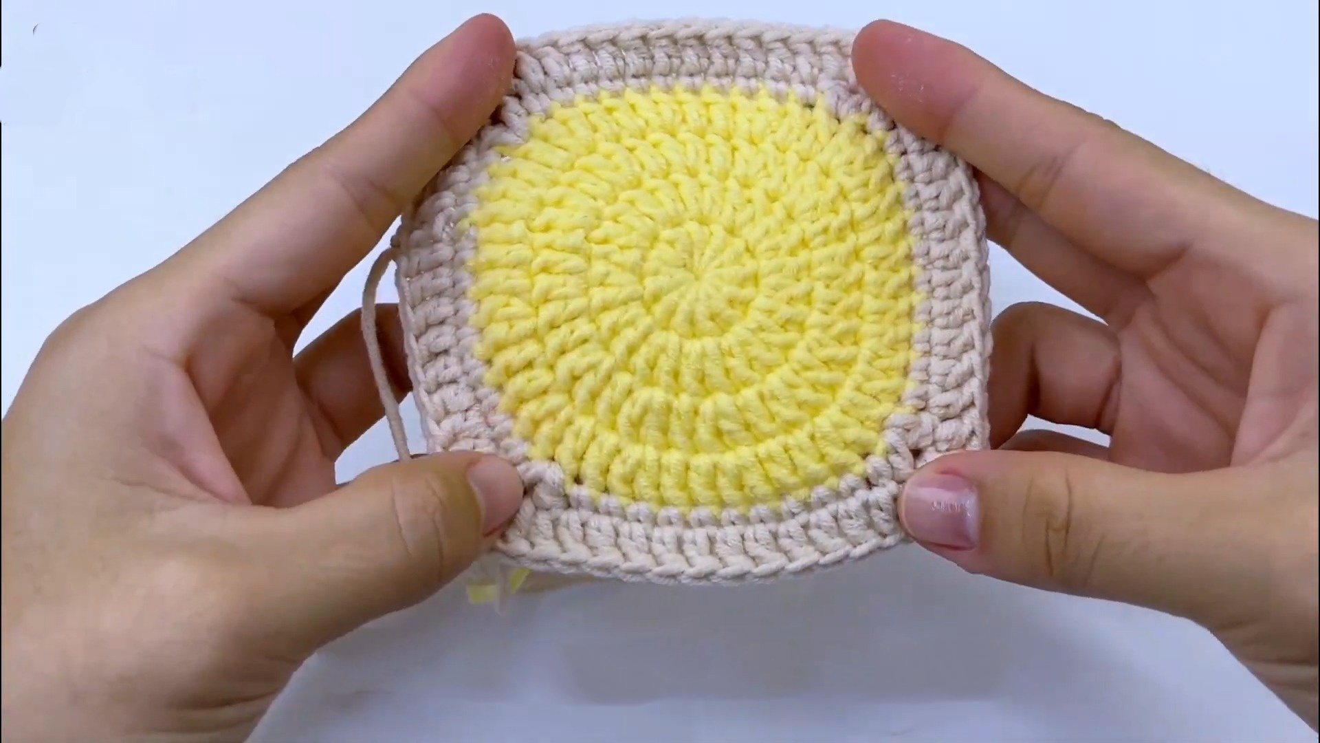 Crochet a Whimsical Smile Emoji Square Coaster - Fun DIY Project for Home Decor
