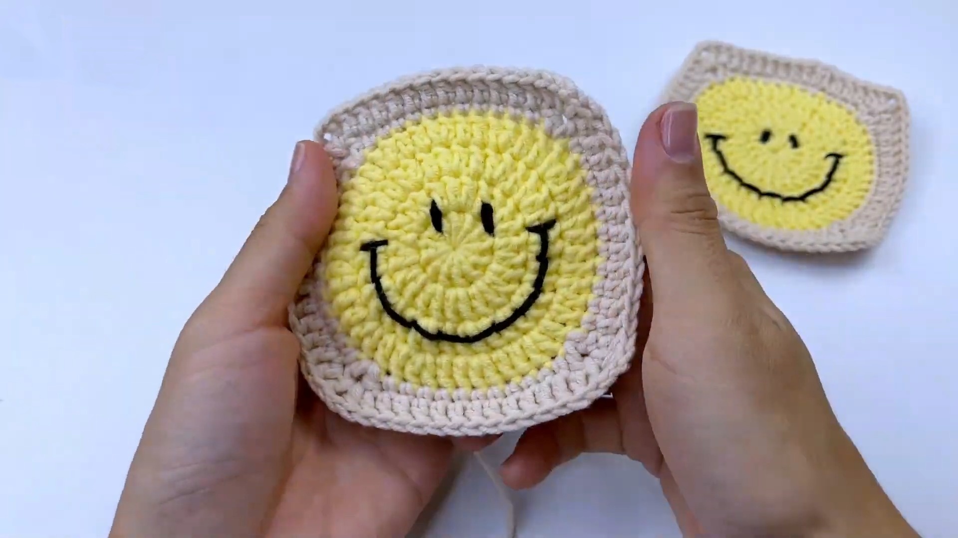 Crochet a Whimsical Smile Emoji Square Coaster - Fun DIY Project for Home Decor