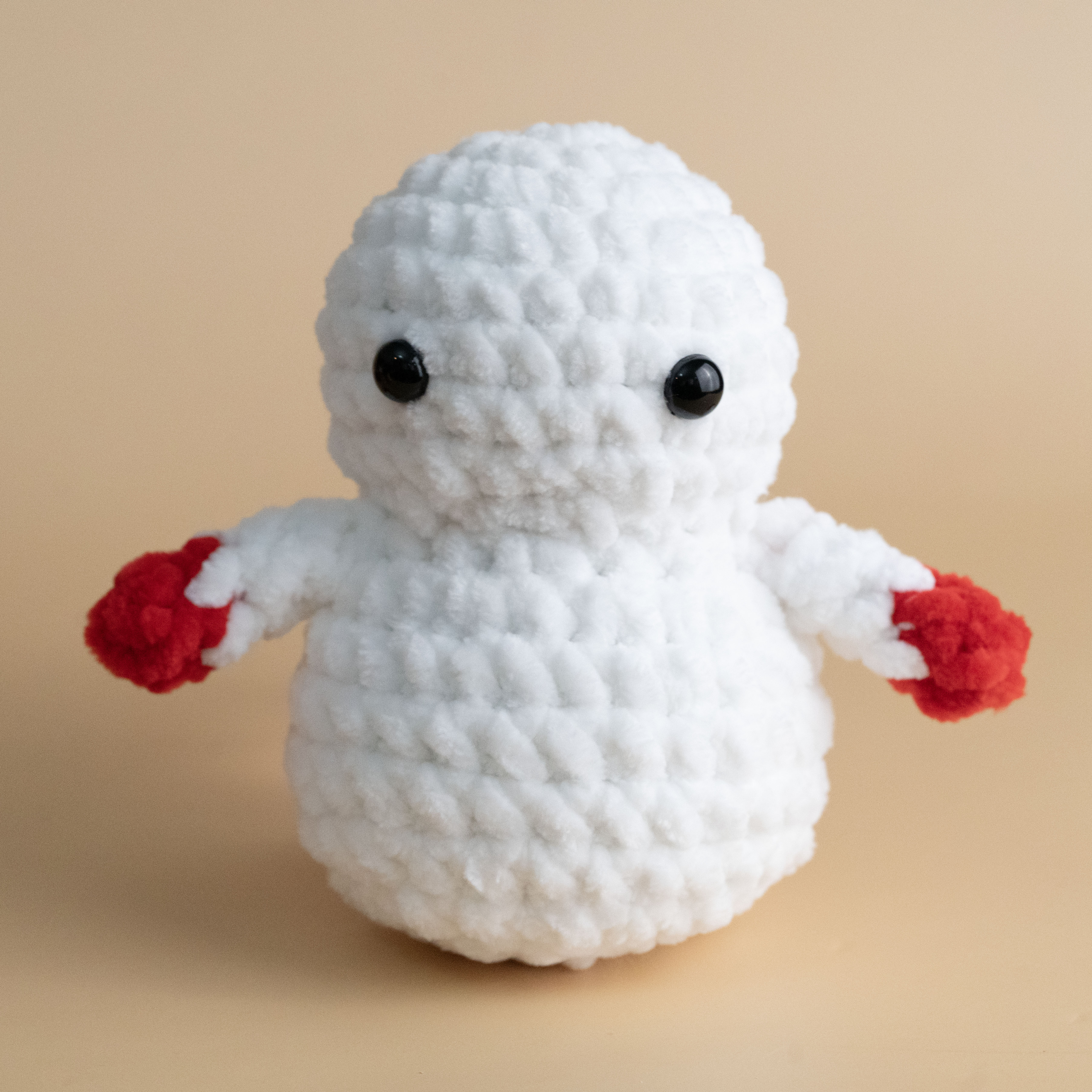 Create Your Own Charming Crochet Snowman Ornament for the Holidays