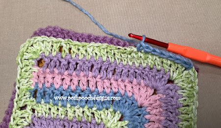 Craft Your Own Colorful Crochet Scrap Happy Granny Square Hot Pad - A Fun DIY Project