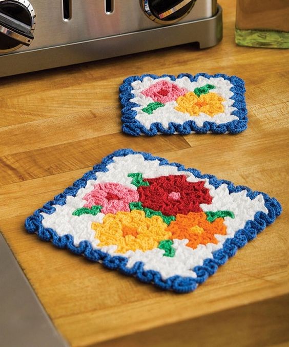 Create a Beautiful Crochet May Flowers Hot Pad and Coaster Set for Your Home