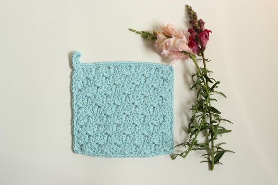 Craft Your Own Beautiful Blue Washcloth with This Easy Crochet Pattern Craft Your Own Beautiful Blue Washcloth with This Easy Crochet Pattern