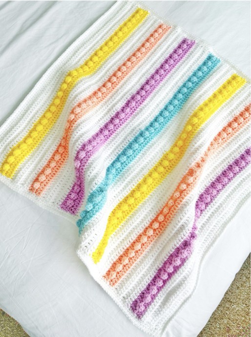 Stay Warm with the Adorable Ava Blanket - A Perfect Crochet Project for Cozy Nights