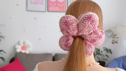 Create Your Own Crochet Puffy Flower Scrunchie for a Fun and Stylish Hair Accessory