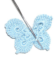 Create Your Own Charming Crocheted Butterfly with Vibrant Colors and Intricate Details